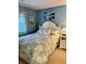 Bedroom with double bed, nightstand and ocean-themed art at 121 Marshland Ct., Myrtle Beach, SC 29572