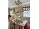 Dining room with glass-top table and wicker chairs at 121 Marshland Ct., Myrtle Beach, SC 29572
