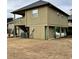 Side view of elevated home showcasing AC unit at 121 Marshland Ct., Myrtle Beach, SC 29572