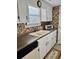 Kitchen with double sink and dark countertops at 121 Marshland Ct., Myrtle Beach, SC 29572
