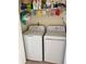 Laundry room with washer, dryer, and shelving at 121 Marshland Ct., Myrtle Beach, SC 29572