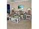 Living room with sofa and rattan coffee table at 121 Marshland Ct., Myrtle Beach, SC 29572