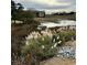 View of marsh grasses and calm water at 121 Marshland Ct., Myrtle Beach, SC 29572