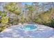 Community hot tub with surrounding brick patio at 1305 Seabrook Plantation Way, North Myrtle Beach, SC 29582