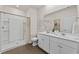 Double vanity bathroom with shower and tile floor at 1325 Palm Springs Paloma Dr, Longs, SC 29568