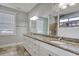 Bathroom with granite double vanity and walk-in shower at 1405 Surf Pointe Dr., North Myrtle Beach, SC 29582