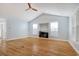 Spacious living room with a cozy fireplace and plenty of natural light at 1405 Surf Pointe Dr., North Myrtle Beach, SC 29582