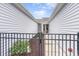 Private courtyard entry with black metal fencing at 1594 Palmina Loop # B, Myrtle Beach, SC 29588