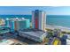 Aerial view of oceanfront high-rise building and surrounding area at 1605 S Ocean Blvd. S # 1413, Myrtle Beach, SC 29577