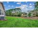 House exterior showcasing the backyard and pond view at 203 Knight Circle # 2, Pawleys Island, SC 29585