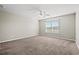 Well-lit bedroom with carpet, neutral walls, and a window at 2209 Beauclair Ct., Myrtle Beach, SC 29579