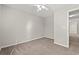 Bright bedroom with neutral walls, carpet, and ceiling fan at 2209 Beauclair Ct., Myrtle Beach, SC 29579