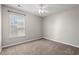 Simple bedroom with neutral walls, carpet and window at 2209 Beauclair Ct., Myrtle Beach, SC 29579