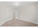 Bright bedroom with neutral walls and carpet at 2209 Beauclair Ct., Myrtle Beach, SC 29579