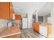 Well-equipped kitchen with wood cabinets and stainless steel sink at 2209 Beauclair Ct., Myrtle Beach, SC 29579