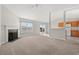 Open living space featuring a fireplace and kitchen access at 2209 Beauclair Ct., Myrtle Beach, SC 29579
