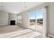 Living room with fireplace, slider to patio, and water view at 2209 Beauclair Ct., Myrtle Beach, SC 29579