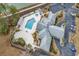Aerial view of community pool, hot tub, and volleyball court at 242 Sun Colony Blvd. # 303, Longs, SC 29568