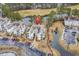 Aerial view of the property highlighting its proximity to a golf course and water features at 242 Sun Colony Blvd. # 303, Longs, SC 29568