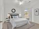 Bright bedroom with a sliding glass door to the patio and lots of natural light at 242 Sun Colony Blvd. # 303, Longs, SC 29568