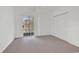 Bedroom with sliding glass door to balcony overlooking a pond, and closet space at 242 Sun Colony Blvd. # 303, Longs, SC 29568