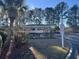Charming community gazebo with visitor parking, nestled among lush trees, offering a relaxing outdoor space at 242 Sun Colony Blvd. # 303, Longs, SC 29568