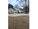 Spacious backyard with large concrete patio and wooden deck at 326 East Godbold St., Marion, SC 29571