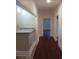 A long hallway with hardwood floors and granite countertop at 326 East Godbold St., Marion, SC 29571