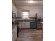 Modern kitchen with granite countertops and stainless steel appliances at 326 East Godbold St., Marion, SC 29571