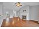 Living room with hardwood floors, fireplace, and access to other rooms at 380 Babylon Pine Dr., Myrtle Beach, SC 29579