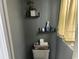 Cozy bathroom with shelving, neutral gray paint, and a practical toilet area at 389 Cabo Loop, Myrtle Beach, SC 29588