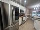 Kitchen with stainless steel appliances and wood cabinets at 389 Cabo Loop, Myrtle Beach, SC 29588