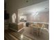 Open-concept kitchen and dining area with white cabinetry and modern lighting at 389 Cabo Loop, Myrtle Beach, SC 29588