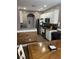 Well-lit kitchen with stainless appliances, white cabinets, and view into the dining area at 389 Cabo Loop, Myrtle Beach, SC 29588