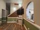 Inviting living room with wood-look floors, views of the kitchen, and staircase at 389 Cabo Loop, Myrtle Beach, SC 29588
