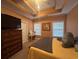 Spacious main bedroom featuring a tray ceiling, large windows, and neutral color palette at 389 Cabo Loop, Myrtle Beach, SC 29588