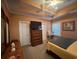 Comfortable main bedroom featuring a dresser with mounted tv, large windows, and neutral color palette at 389 Cabo Loop, Myrtle Beach, SC 29588