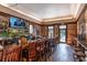 Inviting bar area with wood details, a long counter, ample seating, and well-stocked shelves at 40 Capt Anthony White Ln., Georgetown, SC 29440