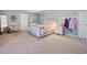Spacious bedroom with a comfortable chair, large bed, and charming decor throughout the light-filled space at 40 Capt Anthony White Ln., Georgetown, SC 29440