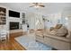 Cozy living room with fireplace, built-in shelving, and comfortable seating at 40 Capt Anthony White Ln., Georgetown, SC 29440