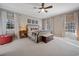 Inviting primary bedroom with plush carpet, natural light and decorative furnishings at 40 Capt Anthony White Ln., Georgetown, SC 29440