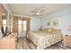 Main bedroom with king-size bed and ceiling fan at 401 N Hillside Dr. # 3C, North Myrtle Beach, SC 29582