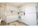 Bright kitchen boasts white cabinets, and modern appliances at 401 N Hillside Dr. # 3C, North Myrtle Beach, SC 29582