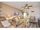 Living room with sofa, chair, and ocean-themed decor at 401 N Hillside Dr. # 3C, North Myrtle Beach, SC 29582
