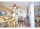 Living room with sofa, chair, and ocean-themed decor at 401 N Hillside Dr. # 3C, North Myrtle Beach, SC 29582