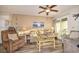 Living room with sofa, chair, and ocean-themed decor at 401 N Hillside Dr. # 3C, North Myrtle Beach, SC 29582