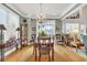 Elegant dining room with hardwood floors and chandelier at 421 Huntington Lake Circle # 82, Pawleys Island, SC 29585