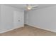 Bright bedroom with neutral walls, carpet, and double doors leading to a closet at 4348 Livorn Loop # 4348, Myrtle Beach, SC 29579