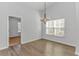Bright dining room with chandelier and hardwood floors at 4348 Livorn Loop # 4348, Myrtle Beach, SC 29579