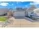 Two-car garage with driveway and landscaped front yard at 4348 Livorn Loop # 4348, Myrtle Beach, SC 29579